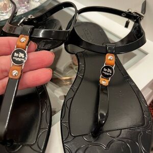 COACH Black Patent Jelly T-Strap Sandals with Tan Trim